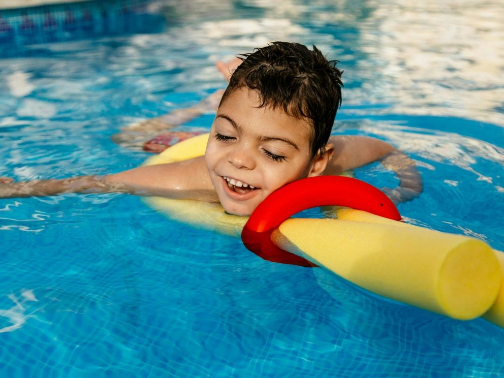 disabled kid in the pool